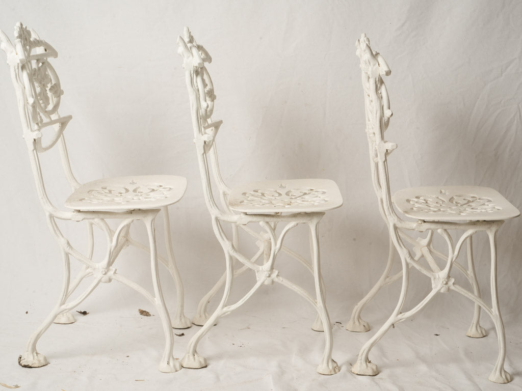 3 Vintage French White Painted Cast Aluminum Garden Chairs w/ Decorative Foliate Backs