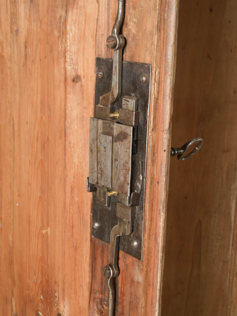 Patina-finished pine farmhouse cupboard
