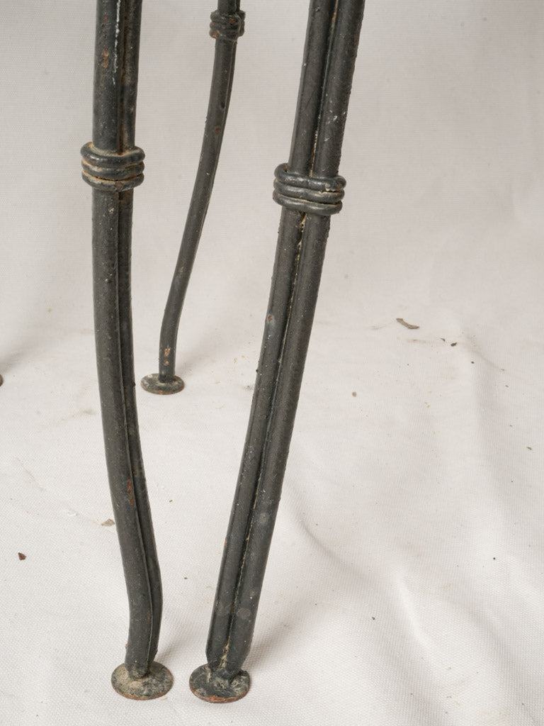 Weathered French outdoor iron chairs