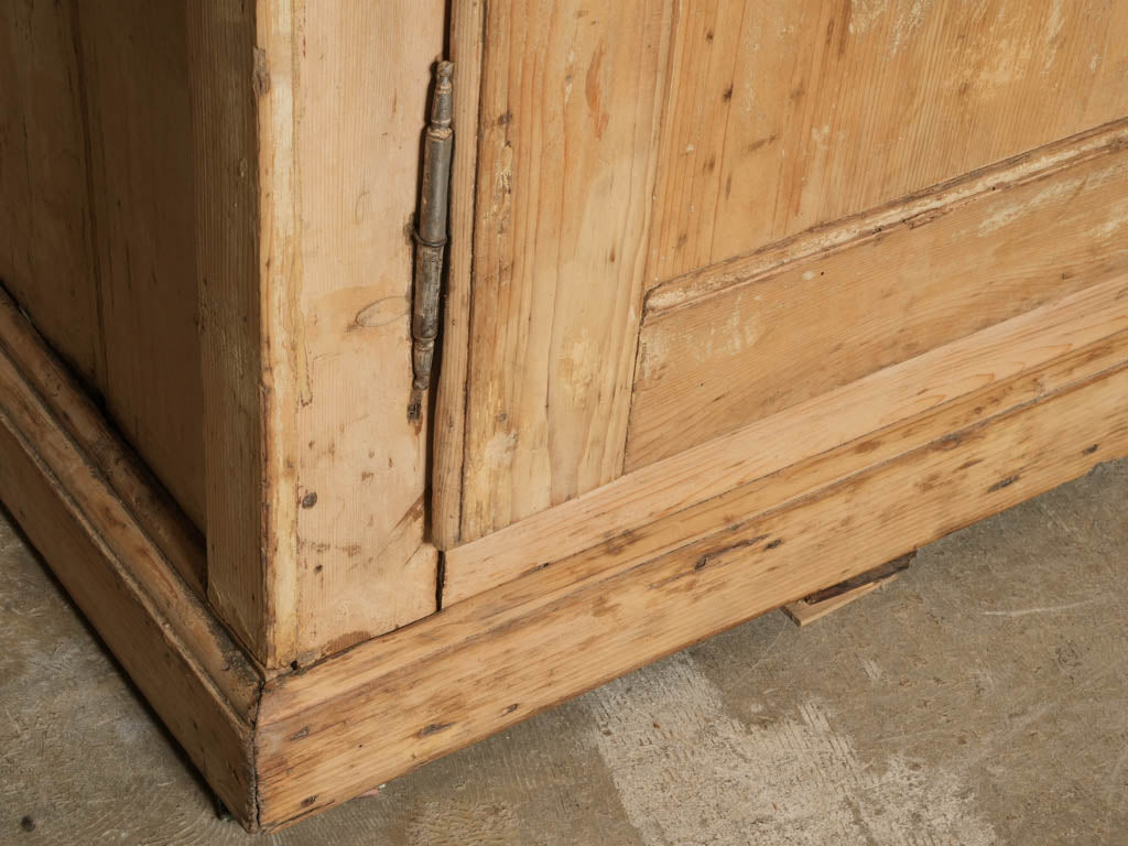 Characterful early 19th-century pine cupboard