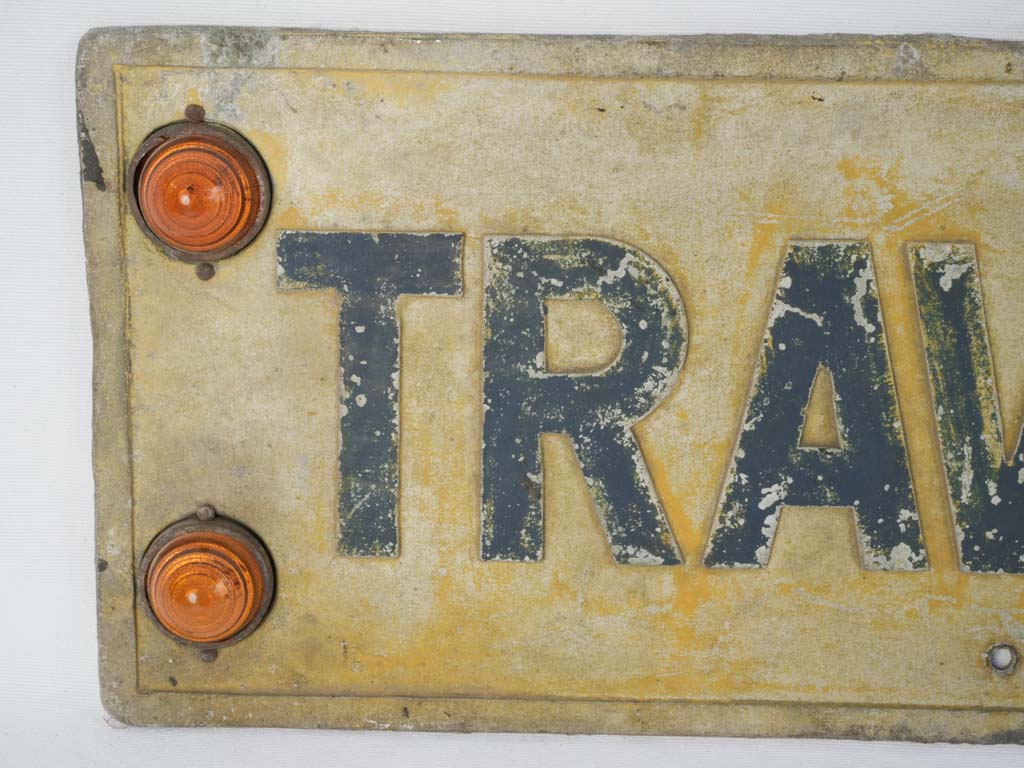 Retro, glass-flashing roadworks sign