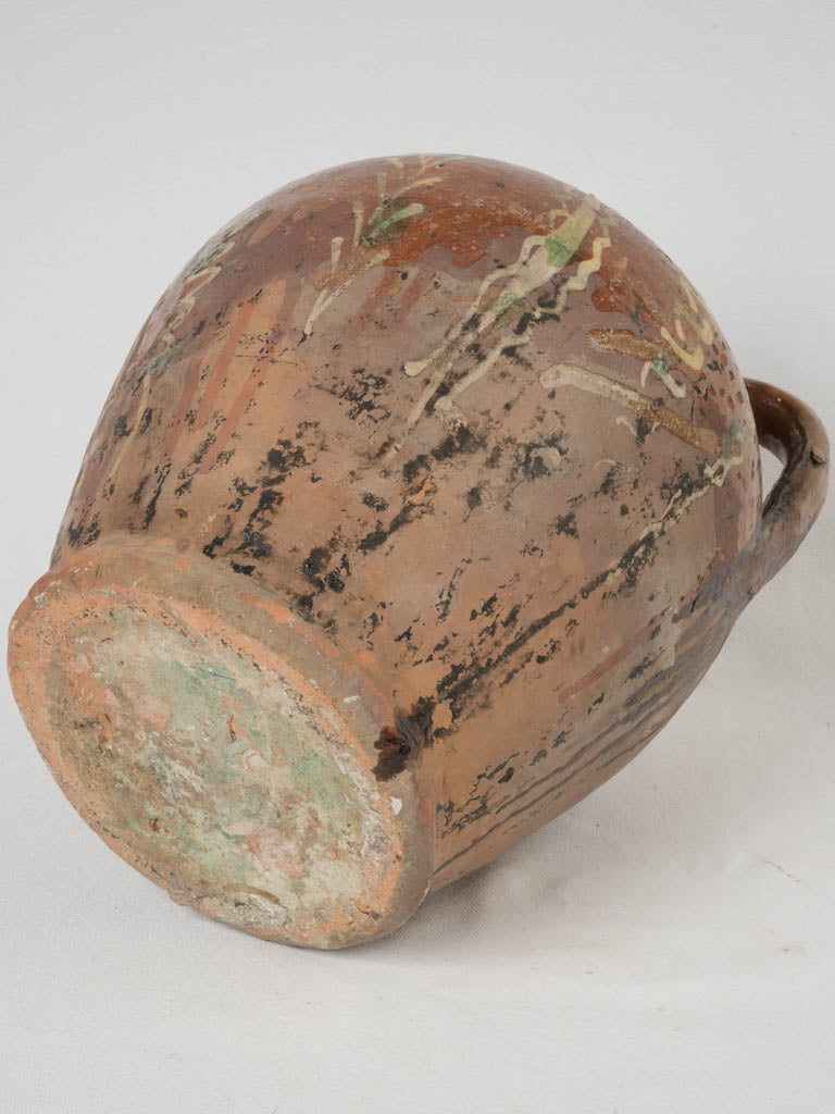 Authentic chipped terracotta jug