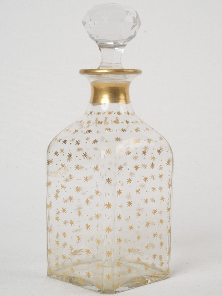 Antique star motif glass carafe