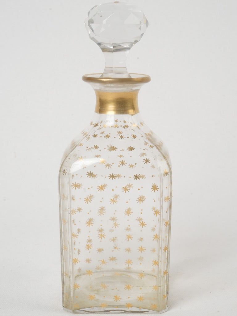 Delicate cut-glass gilding carafe