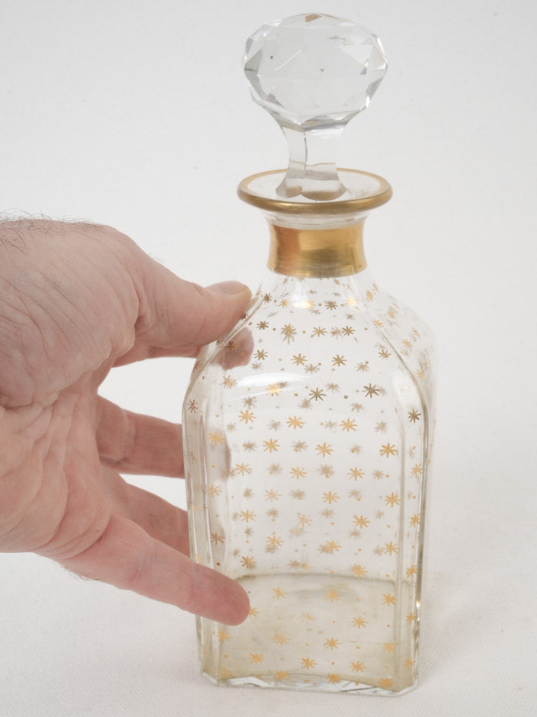 Faceted stopper gold band carafe