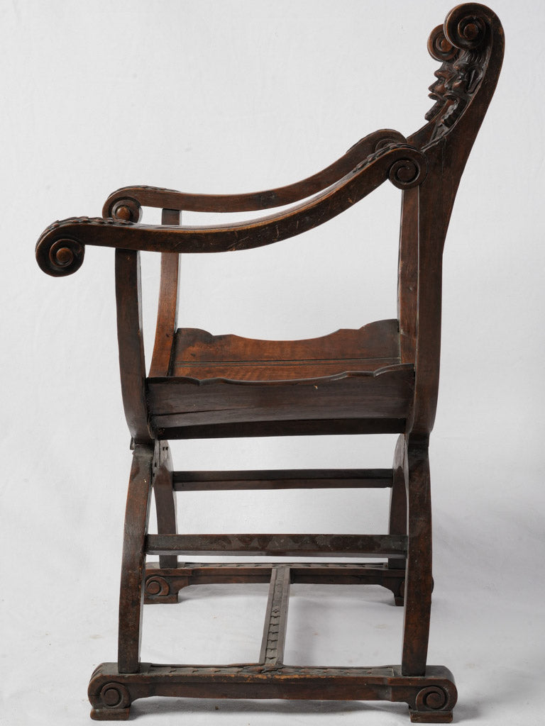 Intricate Italian walnut armchair