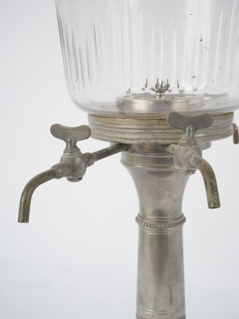 Elegant aged absinthe serving fountain
