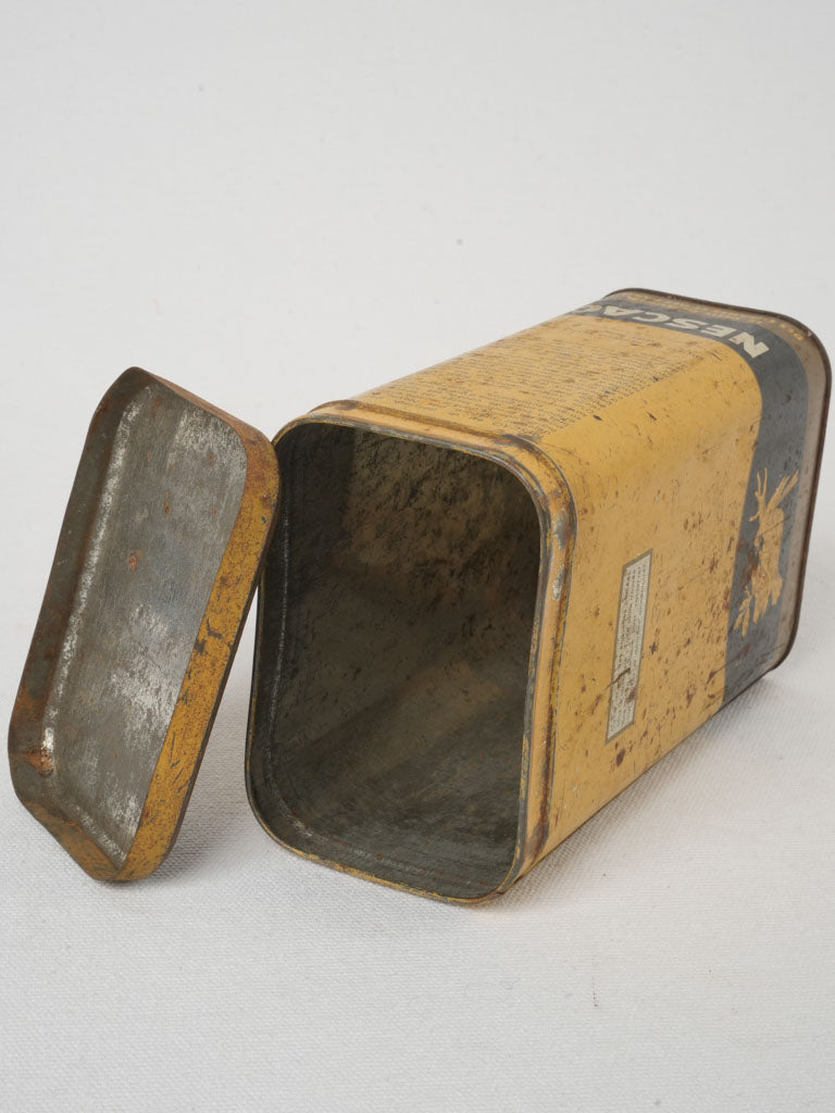 Bold typography Nescao tin