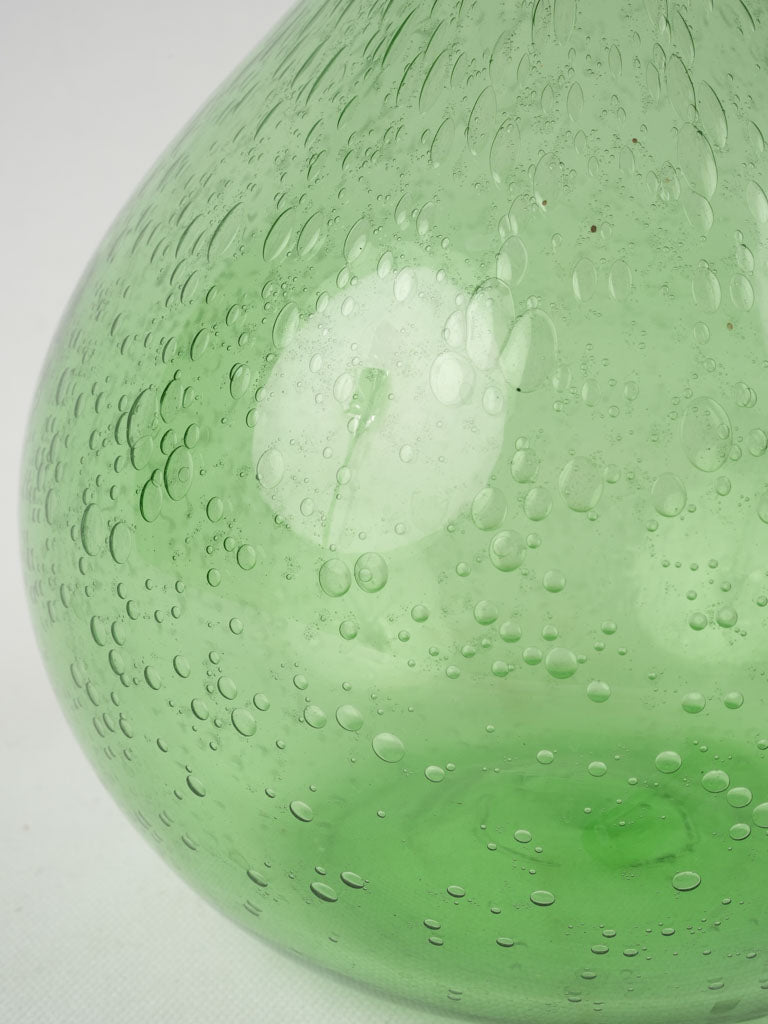 Vintage playfully green glass carafe
