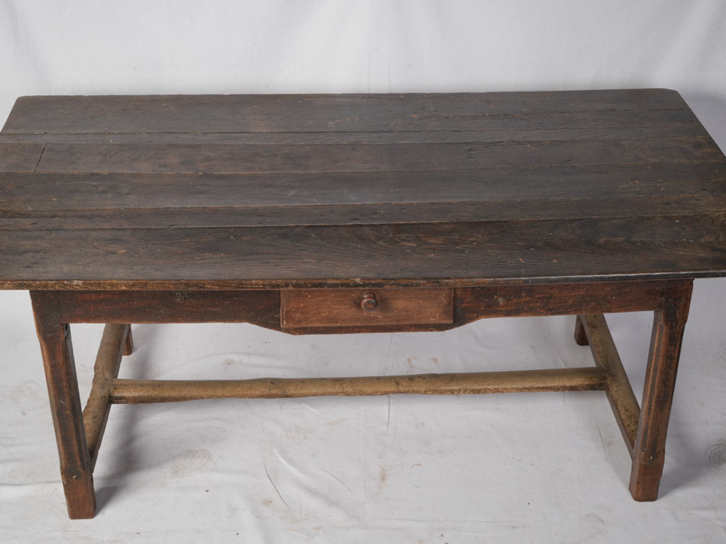 Deep umber-brown patina table