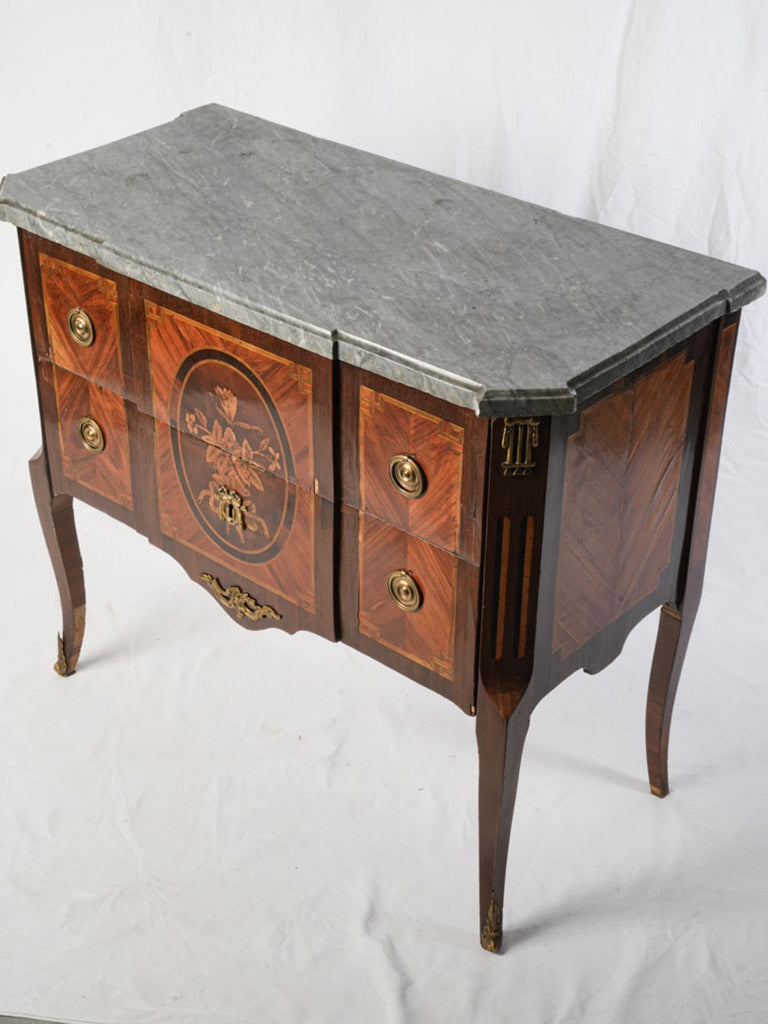 Elegant marquetry brass-mounted commode