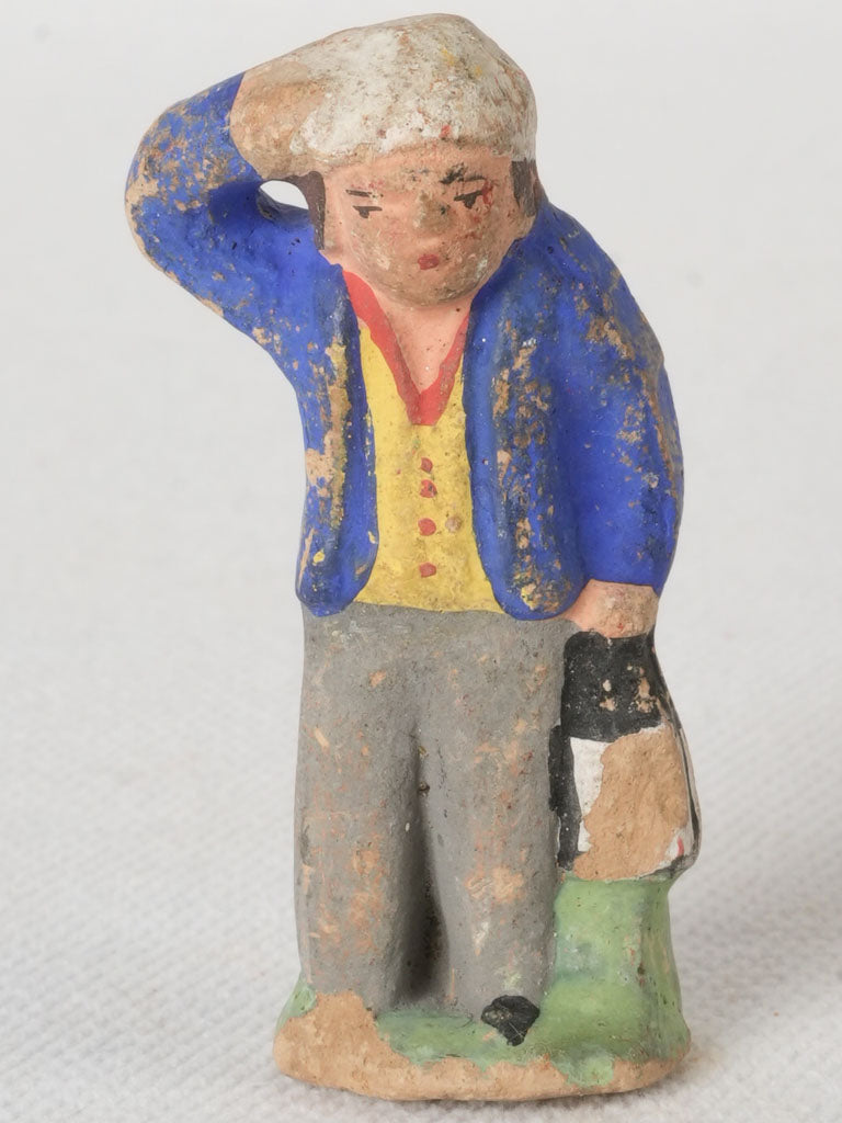Vibrant handmade terracotta figurine