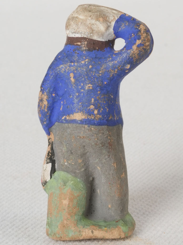 Antique hand-painted terracotta figure