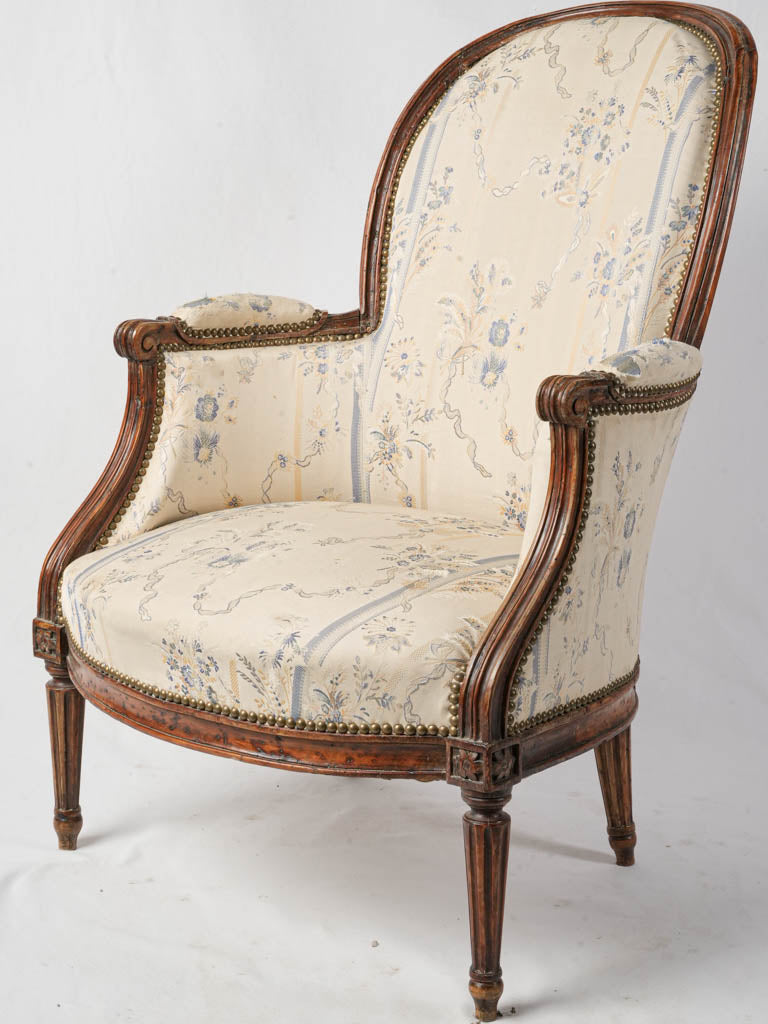 Exquisite walnut Louis XVI armchair