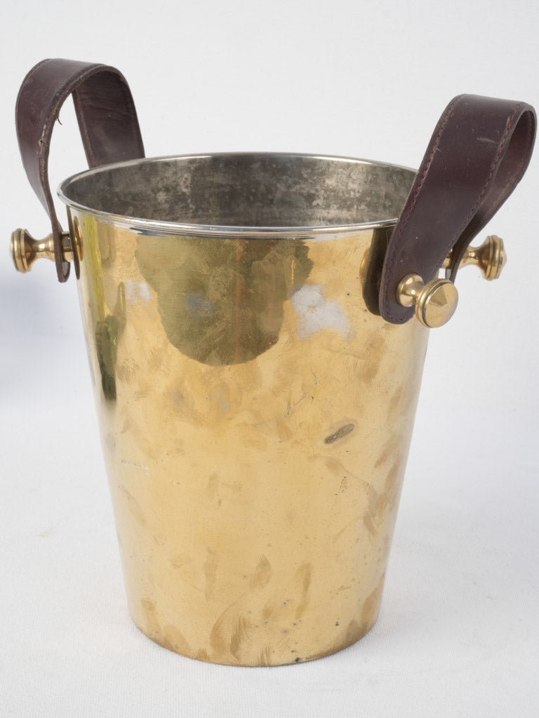 Aged leather-handled ice container