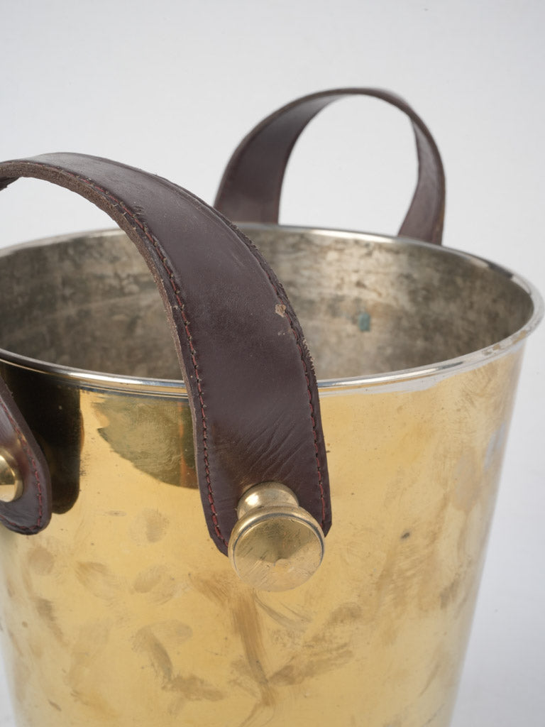 Aged leather strap ice container