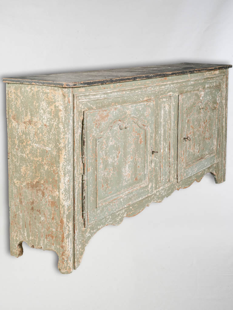 Weathered sage-green vintage buffet