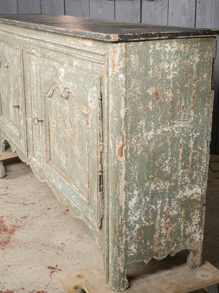 Ivory-traced French provincial buffet
