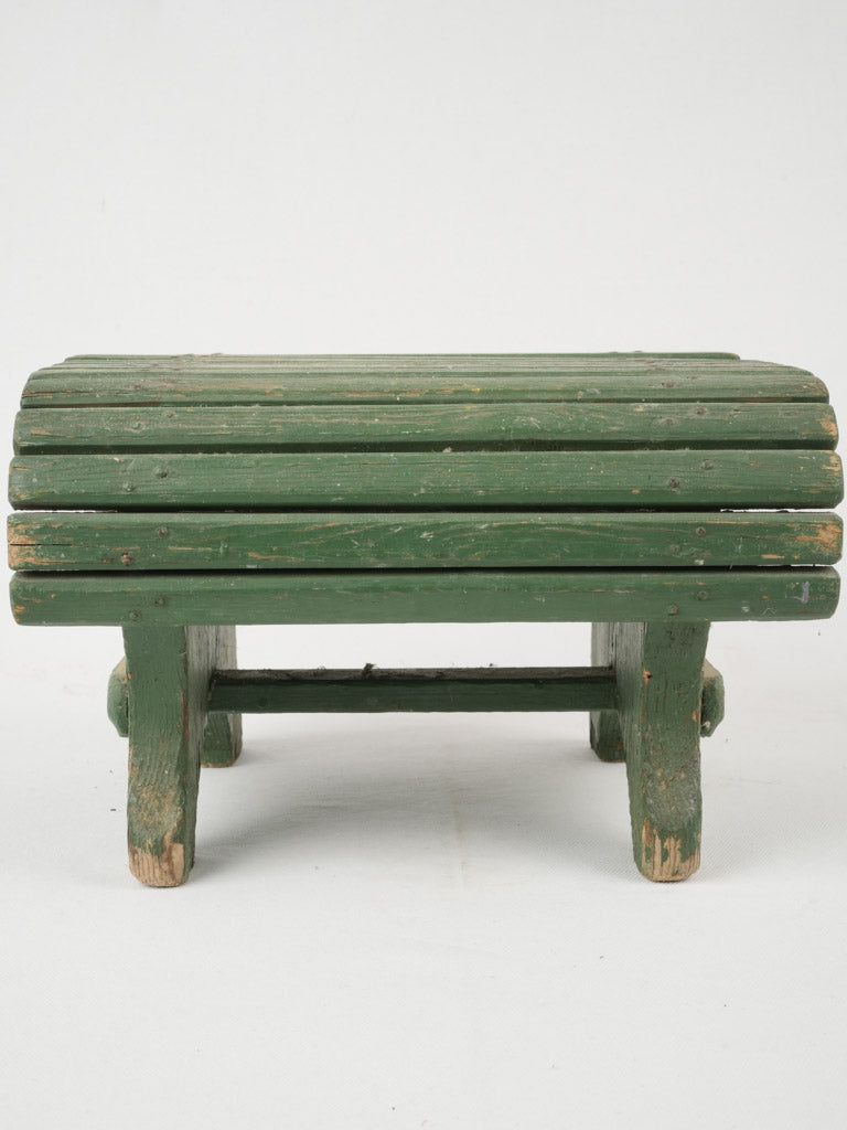 Timeless, quaint, green wooden stool