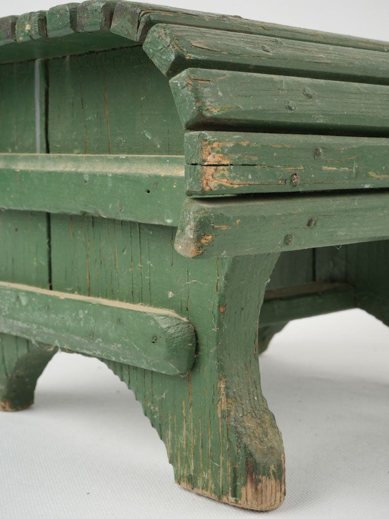 Retro, stylish, green footrest stool