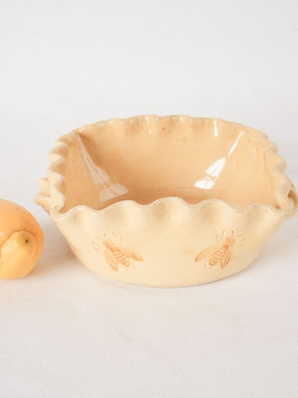 Retro pale-yellow rippled-edge ceramic dish