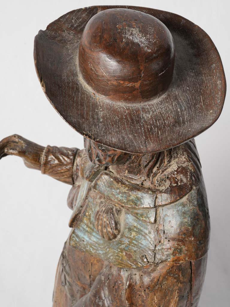 Distressed surface polychrome figure