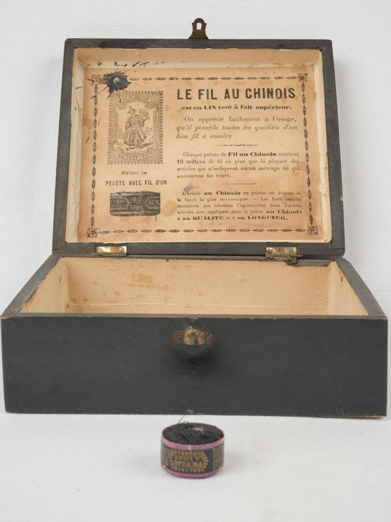 Charming black antique sewing box