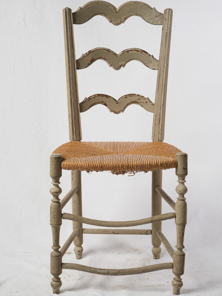 Aged French rush-seat chair
