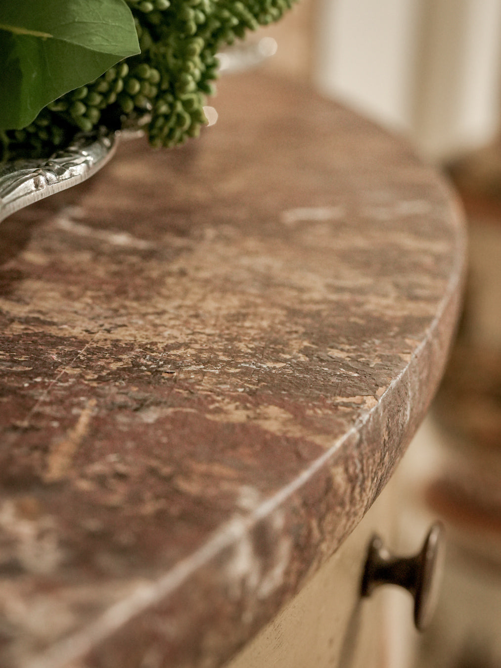 Beige-toned painted curved cabinet