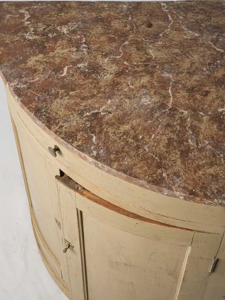 Gently curved façade corner cabinet
