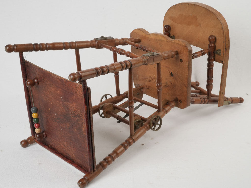 Charming 1950s doll walker chair