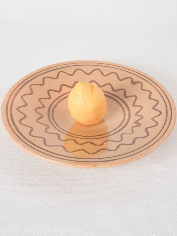 Antique yellow-glazed French omelet plate
