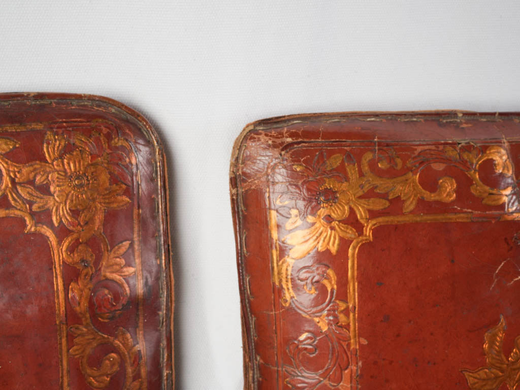 Intricate floral embossed leather cushions