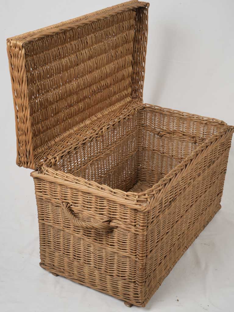 Robust vintage wicker storage trunk