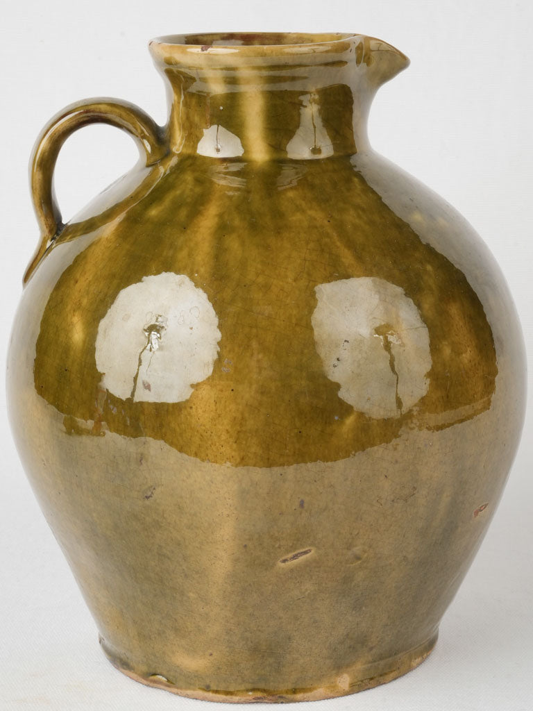 Lustrous green glazed ceramic jug