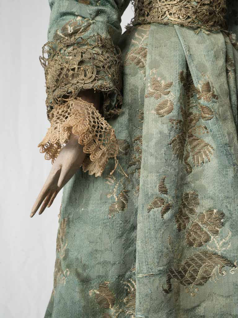 Pale blue historic textile art