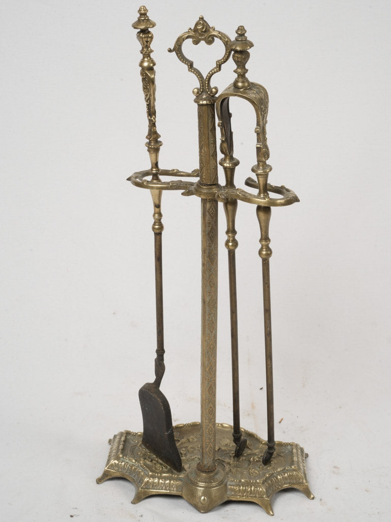 Rococo-inspired fireplace tool set