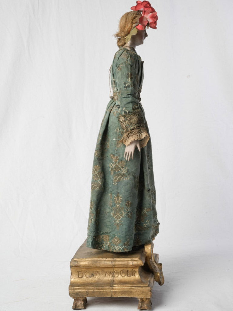 Historic craquelure texture sacred statue