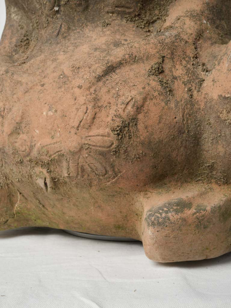 Distinctive moss traces terracotta sculpture