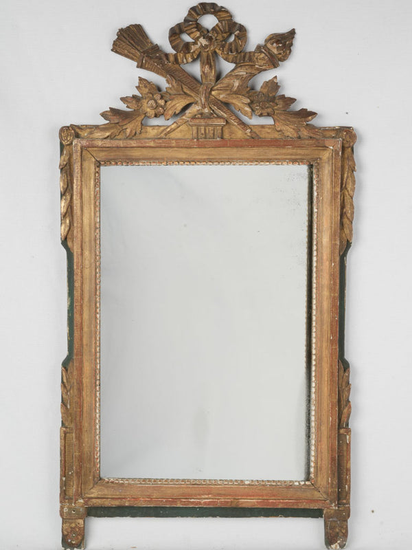 Ornate Louis XVI period footed mirror