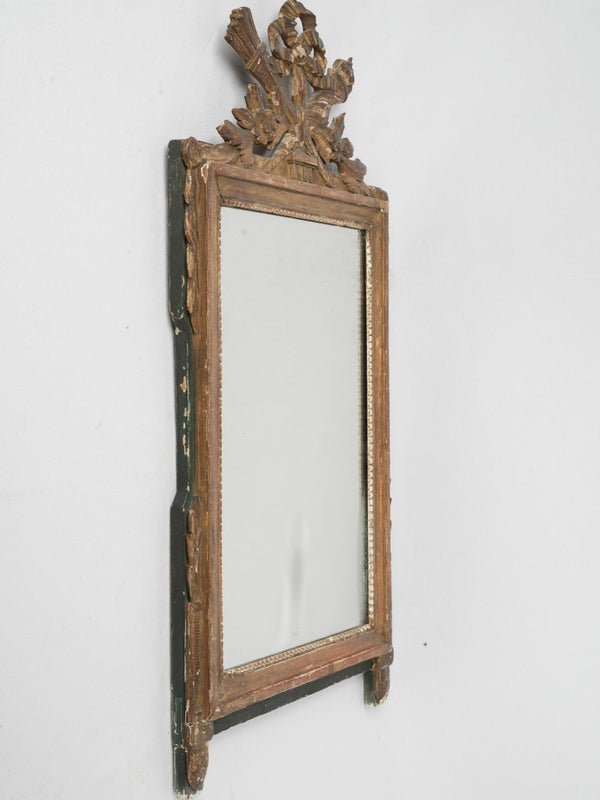 Vintage trophy-adorned mirrored frame