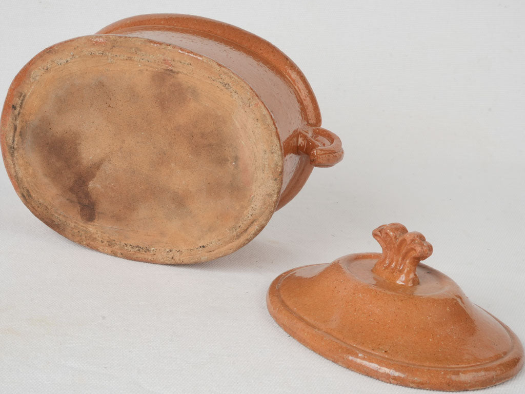 Weathered fan-shaped handled terrine