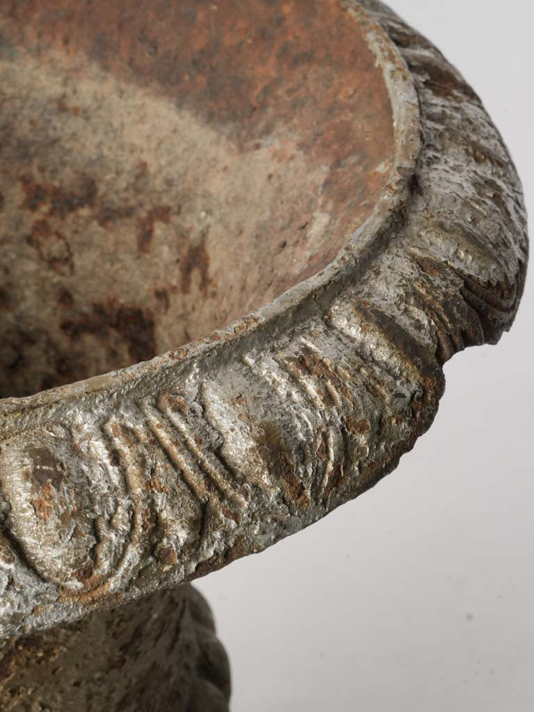 Elegant neoclassical iron garden urns