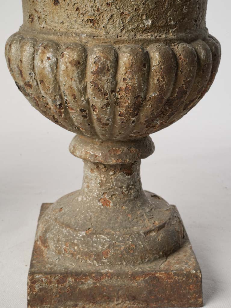 Sculptural weighty cast-iron urns