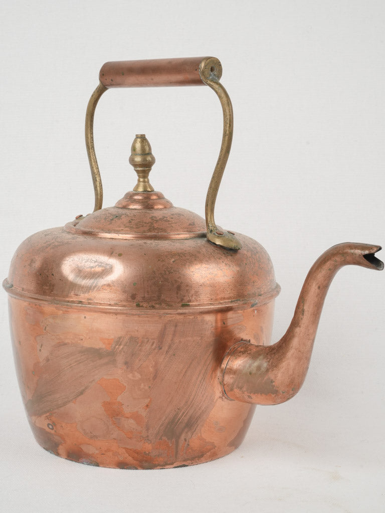 Elegant antique copper kettle