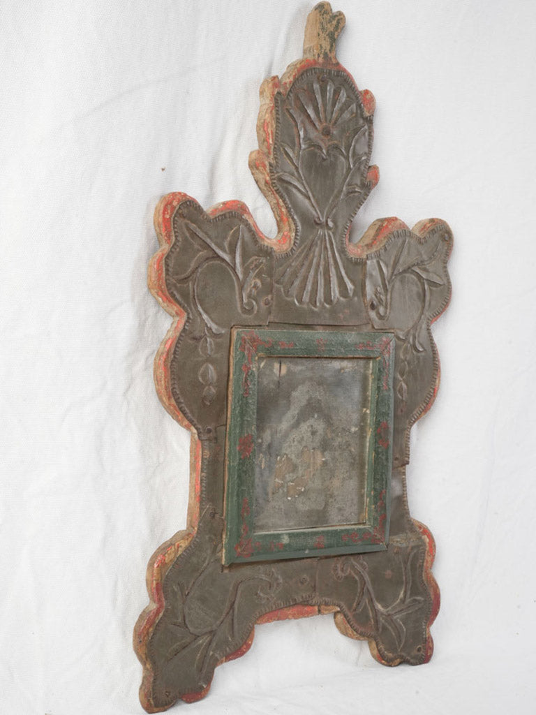 Patinated mid-century carved mirror