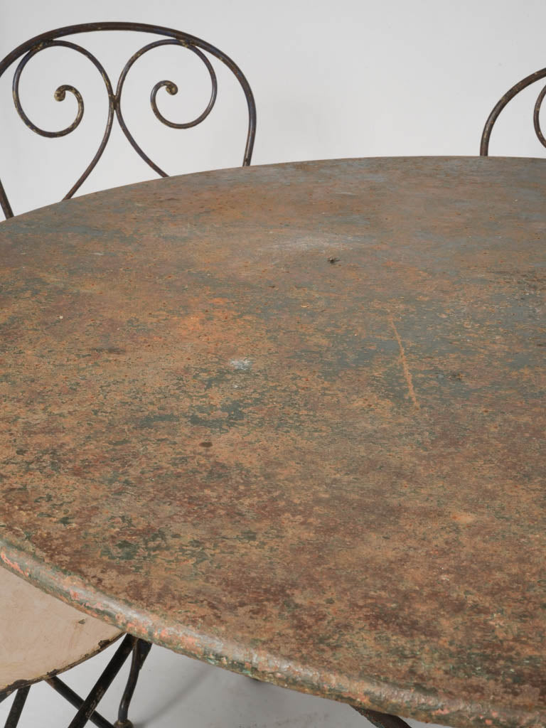 Rustic patinated outdoor table ensemble