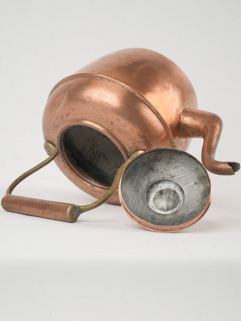 Refined brass-adorned water boiler