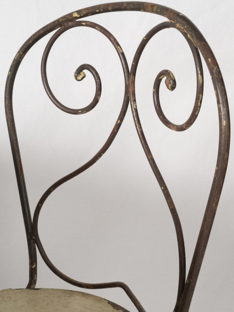 Solid seat vintage iron chairs
