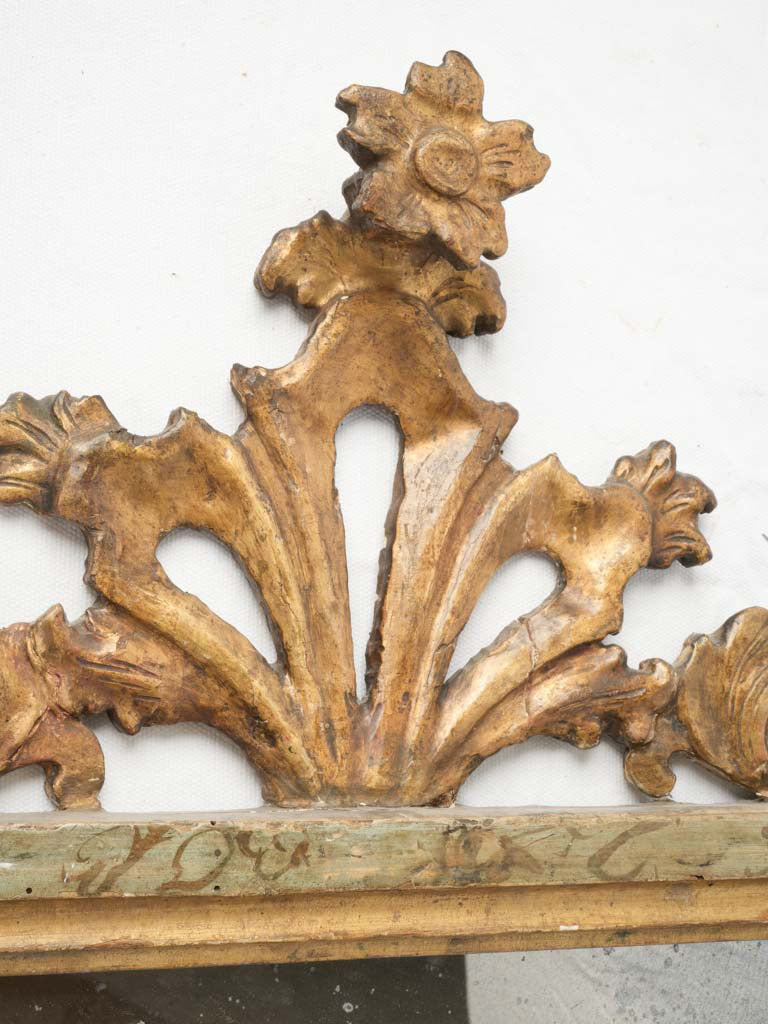 Exuberant gilt Rococo-style wall mirror